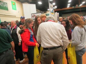 Above, witness Grady Gulliver witnesses to four young ladies. All four prayed to ask Jesus into their hearts.